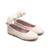 Bailarina comunion beige con flores.