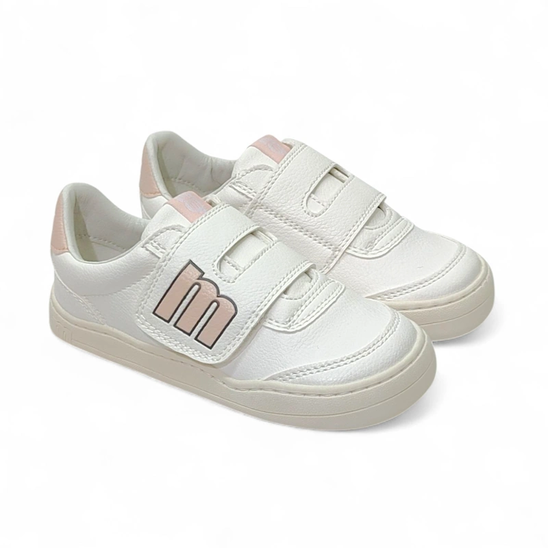 Par de zapatillas deportivas Mustang de niña, blancas con el logo "M" en rosa y cierre de velcro.