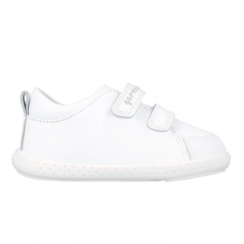 Zapatilla Garvalin barefoot de bebé en color blanco vista de perfil.