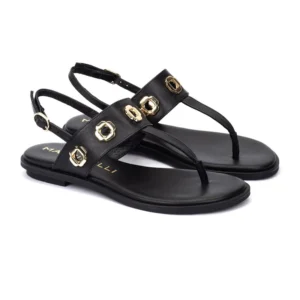 Sandalias planas de mujer Martinelli modelo Mazzini en piel negra con detalles dorados y tira de dedo.