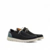 Zapatillas casuales para hombre, color azul marino, con detalles de cuero y suela blanca.