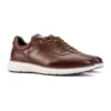 Zapato hombre Martinelli Canterbury marrón, vista diagonal de par completo con cordones y suela blanca